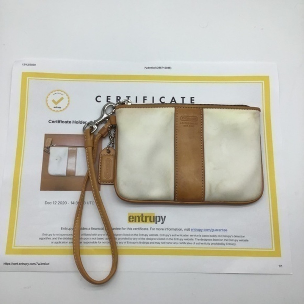 COACH white canvas w/brown trim wristlet